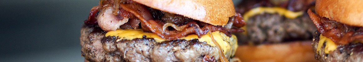 Eating Burger Hot Dog Sandwich at Carney's Restaurant restaurant in Studio City, CA.